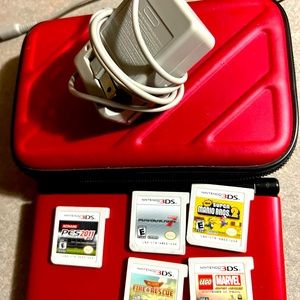3DS console , games , charger and case ! These are 3 years old !